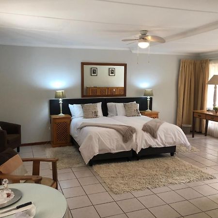 Beyond Cui Bono Guesthouse Адо Екстериор снимка